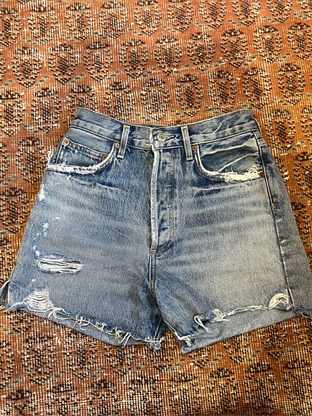 Agolde Faded Blue Distressed Denim Shorts